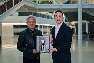 LG Corp. Chairman and CEO Kwang Mo Koo (right) and NVIDIA founder and CEO Jensen Huang (left) pose for a photo while holding a miniature humanoid robot at NVIDIA's headquarters in Santa Clara, California, on Aug. 13th. The robot presented by LG bears the autographs of LG Corp. Chairman and CEO Kwang Mo Koo and NVIDIA founder and CEO Jensen Huang.