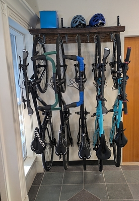 Five bikes in a four-foot space, seconds per bike, with no tools.