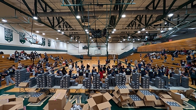 Round Room surprised six Indianapolis schools with $375,000 in shoes and socks for the new school year.