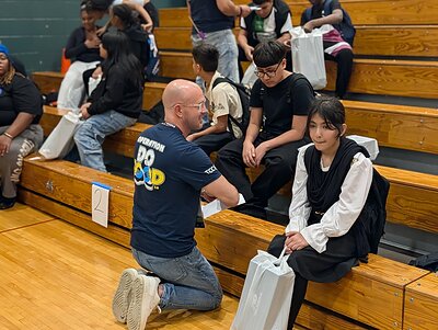 Round Room surprised six Indianapolis schools with $375,000 in shoes and socks for the new school year.