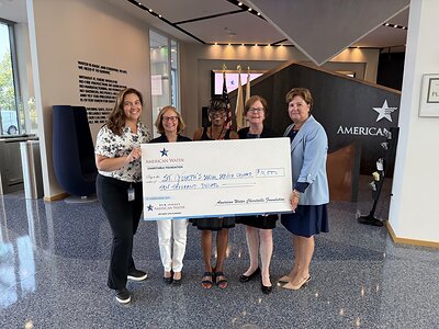 Pictured from left are Chelsea Kulp, director of communications and external affairs, New Jersey American Water; Carrie Williams, president, American Water Charitable Foundation; Bernadette Murphy, executive director, St. Joseph Social Service Center; Doreene Bennett, senior workforce development program manager, New Jersey American Water; and Kim S. Downes, vice president of business development and government and external affairs, New Jersey American Water. 