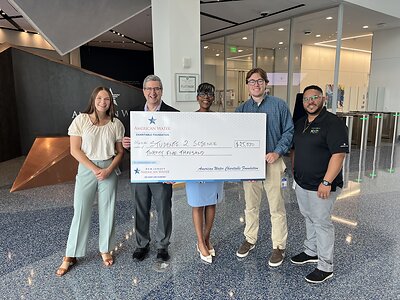 Pictured from left are Erin Banes, senior manager of external communications, New Jersey American Water; Frederick Hage, senior director of development, Students 2 Science; Doreene Bennett, senior workforce development program manager, New Jersey American Water; Charlie Bell, external affairs intern, New Jersey American Water; and Joey Rodriguez, senior external affairs specialist, American Water. 
