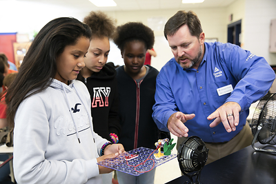 Georgia Power education team interacts with students.