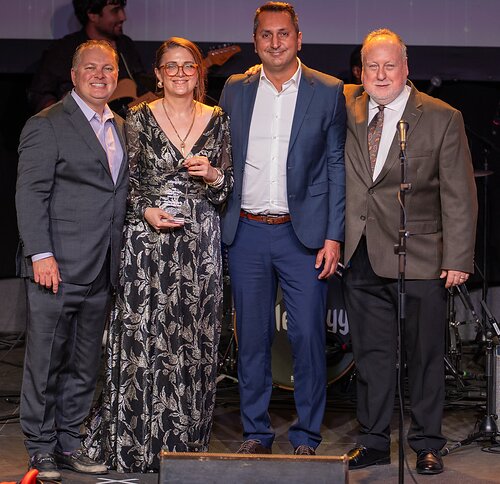 AlphaGraphics' Great Lakes Region Center of the Year winner for 2026 is its Brentwood, Tenn. location owned by Diana Khutsishvili and Ahsan Irshad, who were honored at the company's 56th annual conference in Chattanooga, Tenn. in July 2026. Pictured (from left) are AlphaGraphics Chief Commercial Officer and Country Manager Jon Visser, Khutsishvili, Irshad, and AlphaGraphics Business Development Coach Bob Fiume. AlphaGraphics' Great Lakes Region Center of the Year winner for 2026 is its Brentwood, Tenn. location owned by Diana Khutsishvili and Ahsan Irshad, who were honored at the company's 56th annual conference in Chattanooga, Tenn. in July 2026. Pictured (from left) are AlphaGraphics Chief Commercial Officer and Country Manager Jon Visser, Khutsishvili, Irshad, and AlphaGraphics Business Development Coach Bob Fiume.