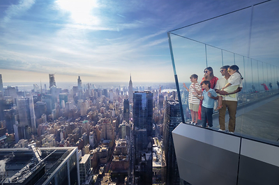 Family on Eastern Overhang of Edge Skydeck
