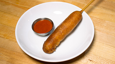 Custom Burger’s State Style Fair-Battered SPAM® Dog: A savory battered SPAM® dog served with pineapple ketchup