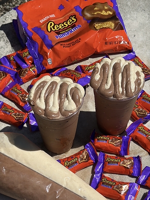 A new collaboration with The Nitro Bar pours the iconic peanut butter of Reese’s Pumpkins into a limited time fall drink 