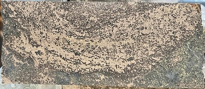 Figure 4: Banded pods of massive sulphide with chromite (208.45 – 208.55 m).