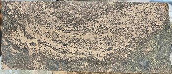 Figure 4: Banded pods of massive sulphide with chromite (208.45 – 208.55 m).