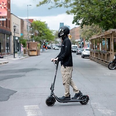 Man riding an Apollo Dash on the road