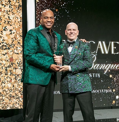 Anton Gunn receives the coveted NSA Hall of Fame -CPAE Award from Brian Walter, CSP, CPAE