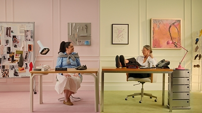 MEG STALTER KICKS DOWN JENNA LYONS’ OFFICE DOOR IN CHAOTIC FOOTWEAR FEUD FOR VIVAIA’S FW26 AD CAMPAIGN: “EVERYONE SHOULD GET TO DO IT ONCE IN THEIR LIVES”