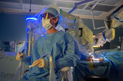 Dr. Nicholas Panetta uses the Symani Surgical System during a surgery at Tampa General Hospital.