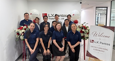 LX Pantos Thailand employees pose for a group photo at the opening ceremony