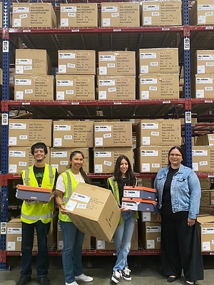 Barrett’s team celebrates the successful go-live of STOKE Shoes in Montebello, California.