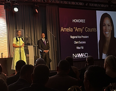Amy Counts delivers her speech after being named the 2026 NAMAD Woman of the Year.