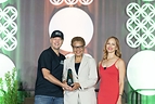 Net Zero Conference Founder Drew Shula and media personality Amy Paffrath present a Trailblazer Award to Los Angeles Mayor Karen Bass at the 2026 event. Photo Credit: Ling Luo