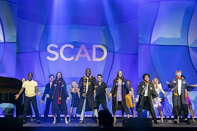 SCAD's elite performance ensemble, the Bee Sharps perform at the 2025 commencement ceremony which included a performance and speech by Jon Batiste.
