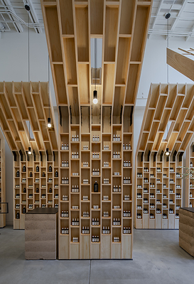 OLIVE TREE PEOPLE’s Waterless Beauty collection rises within soaring olive-tree-inspired wooden structures inside the brand’s first U.S. flagship—its “cathedral to Waterless Beauty.”