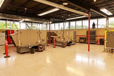 The 6,000-square-foot training space at Lennox's new NAS headquarters provides hands-on learning opportunities with commercial HVAC equipment and systems. 