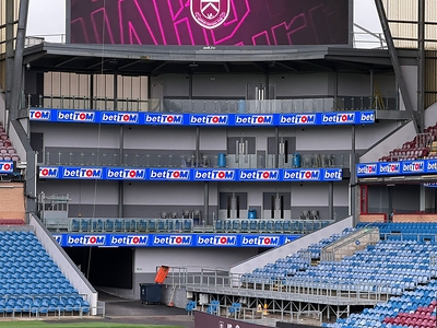 betTOM's LED branding at the Turf Moor Stadium