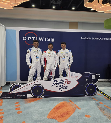 The Optiwise.ai Team at Walmart Seller Summit 2026 with the Digital Pen RaceCar