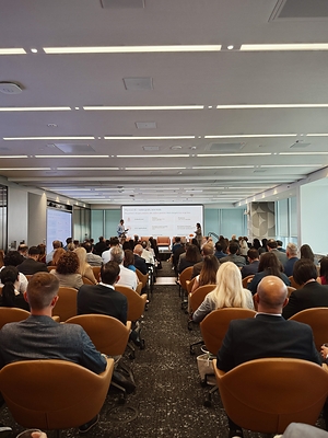Subo Chatterjee, Partner and Physical AI and Emerging Technology Leader, and Annie Veillet, Partner and Chief Technology Officer, PwC Canada, present to a full house at "Physical AI in the Real World."