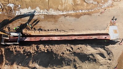 Aerial view of Roman Stone's EZ-KEY™ Precast Duct Bank System being installed for a hyperscale data center project in Canton, Ohio. Aerial view of Roman Stone's EZ-KEY™ Precast Duct Bank System being installed for a hyperscale data center project in Canton, Ohio.