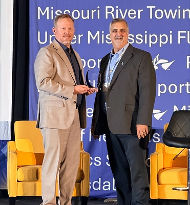 Standing right to left, Jody Peacock, CEO of Ports of Indiana, and Anthony Gex, Deputy Director of IRPT Standing right to left, Jody Peacock, CEO of Ports of Indiana, and Anthony Gex, Deputy Director of IRPT