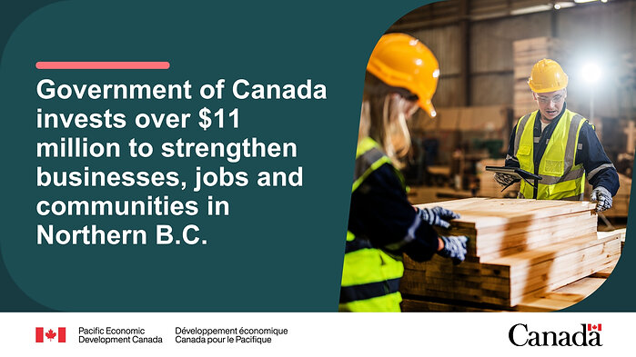 Two workers wearing yellow hard hats and reflective vests inspecting stacks of lumber inside a warehouse. Text reads: Government of Canada invests over $11 million to strengthen businesses, jobs and communities in Northern B.C.