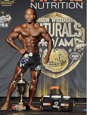 Natural vegan bodybuilder Torre Washington, 51, wins the 2025 Ben Weider Naturals, qualifying for Mr. Olympia.