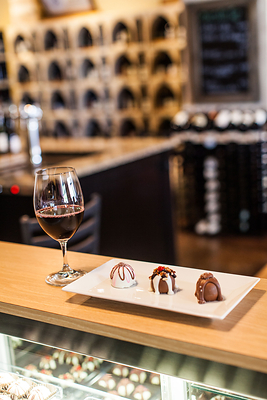 Chocolate truffles pairing with glass of wine