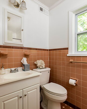 One of two bathrooms at 5280 Moore Street in Stone Mountain, Georgia. Photo: Daniel Stabler, Quiet Street Photography.