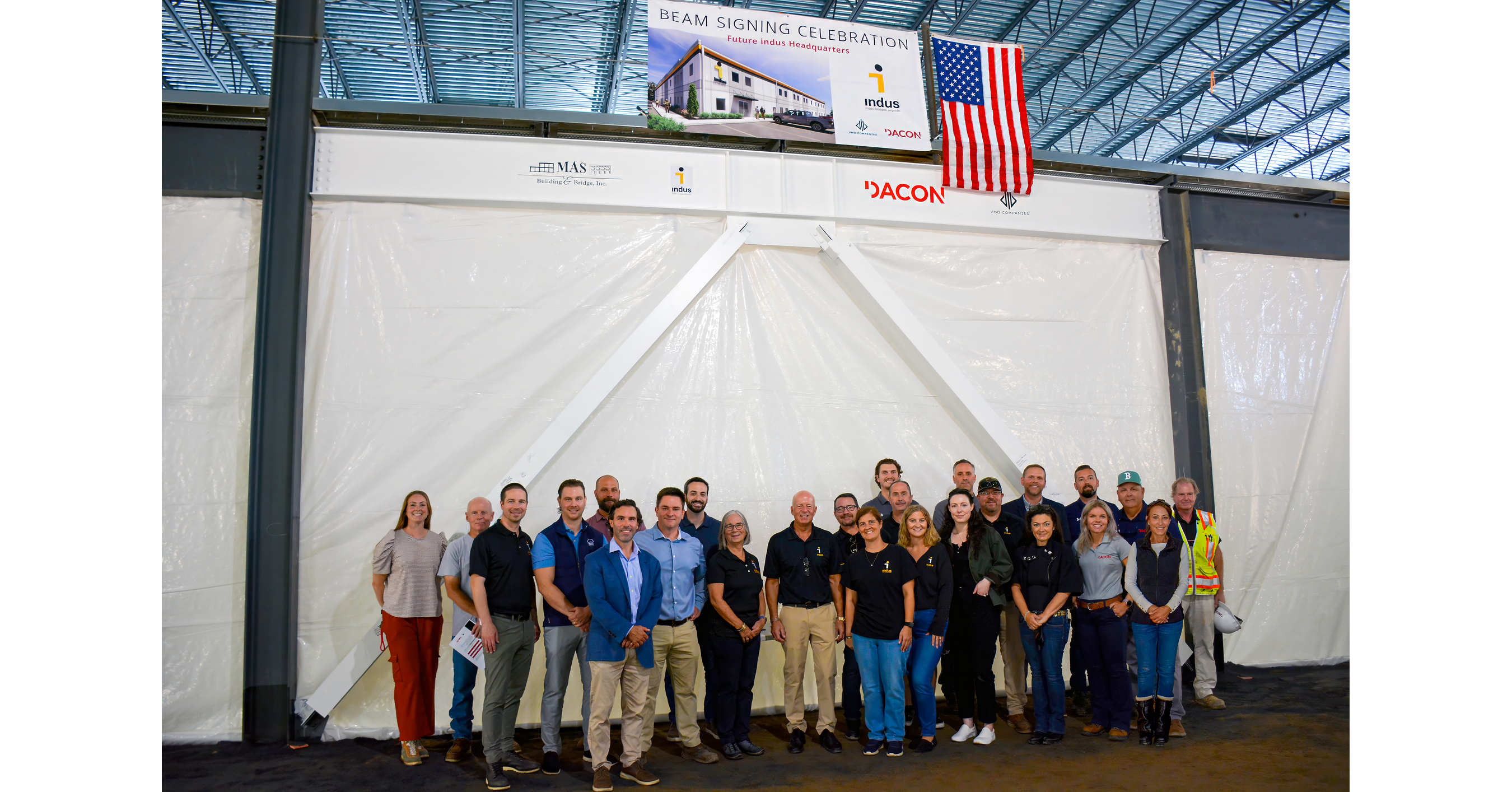 Dacon Corporation, indus, and VMD Companies Celebrate Major Construction Milestone with Cross Beam Signing Ceremony