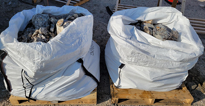 Figure 3: Bulk tonnage bags of pollucite pegmatite sample composites ready for shipping to the lab (see Table 1). Figure 3: Bulk tonnage bags of pollucite pegmatite sample composites ready for shipping to the lab (see Table 1).