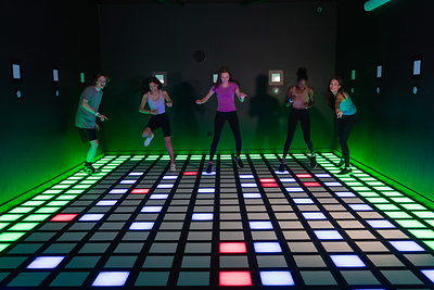 Young adults playing Mega Grid at Activate