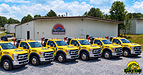 Gator's truck fleet outside the HeatShield Metal Roofing manufacturing plant in Asheboro, NC.