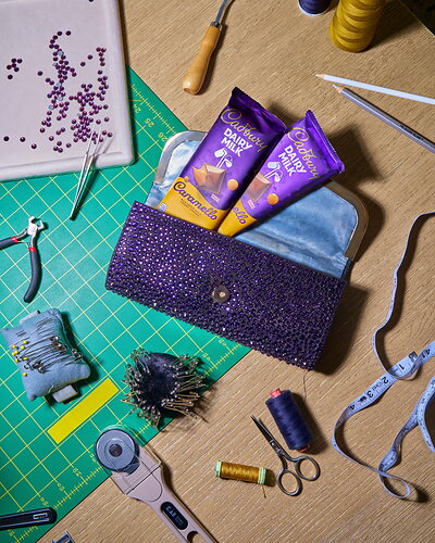 The limited-edition Cadbury Clutch, an insulated design by LUAR Founder & Creative Director Raul Lopez, that keeps chocolate cool and makes it easy to share.
