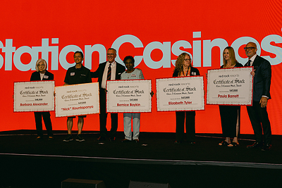 Long-Term Station Casinos Team Members from the 1970s Receive $1,000 Worth of Red Rock Resorts Stock for Every Year Worked at the Company. Left to Right: Barbara Alexander, Somnuk “Nick” Kountapanya, Frank Fertitta III, Bernice Boykin, Elizabeth Tyler, Paula Barrett, Lorenzo Fertitta.