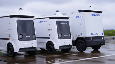 Neolix autonomous delivery vehicles are parked at Tokyo Ryutsu Center.