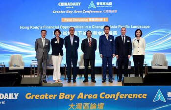 (From left) Zhou Li, deputy editor-in-chief of China Daily and editor-in-chief of China Daily Hong Kong; Amy Lo, chairman of UBS Global Wealth Management Asia, head and chief executive of UBS Hong Kong; Edward Tse, founder and CEO of Gao Feng Advisory Company; Carlson Tong Ka-Shing, chairman of Hong Kong Exchanges and Clearing Limited; Levin Wang, chief executive officer of Huatai Financial Holdings (Hong Kong) Limited; Robert Lee Wai-wang, member of the Legislative Council; and Mary Huen, chief executive officer of Hong Kong and Greater China & North Asia at Standard Chartered, pose for a group photo during a panel discussion at the Greater Bay Area Conference 2026 in Hong Kong on Sept 3, 2026. (EDMOND TANG/CHINA DAILY) (From left) Zhou Li, deputy editor-in-chief of China Daily and editor-in-chief of China Daily Hong Kong; Amy Lo, chairman of UBS Global Wealth Management Asia, head and chief executive of UBS Hong Kong; Edward Tse, founder and CEO of Gao Feng Advisory Company; Carlson Tong Ka-Shing, chairman of Hong Kong Exchanges and Clearing Limited; Levin Wang, chief executive officer of Huatai Financial Holdings (Hong Kong) Limited; Robert Lee Wai-wang, member of the Legislative Council; and Mary Huen, chief executive officer of Hong Kong and Greater China & North Asia at Standard Chartered, pose for a group photo during a panel discussion at the Greater Bay Area Conference 2026 in Hong Kong on Sept 3, 2026. (EDMOND TANG/CHINA DAILY)