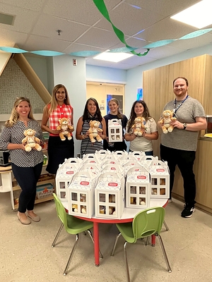 Photo Caption: Representatives from Suburban Propane, The NASCAR Foundation and St. Joseph’s University Hospital hold NASCAR-themed Speedy Bears during a September 10 visit to the Paterson, New Jersey, hospital. 