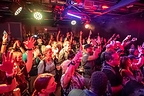 Audience experiencing Music Not Impossible vests