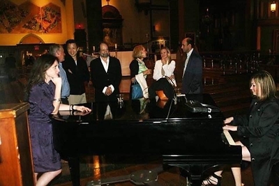 Concert pianist Maria Stalin-Andriasova performs for her paternal relatives, the members of The Royal Family of Iran, Qajar Dynasty, at Guillermo Esparza's Sacred Art reception. All Rights Reserved.
