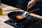 Flambo Stainless Carbon Daily Pan cooking salmon