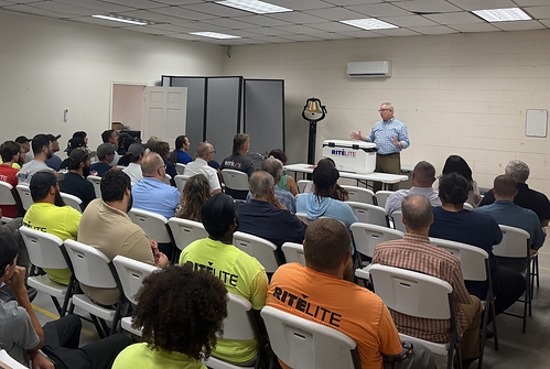 Jamie Harden, CEO of Creative Sign Design, speaks to Rite Lite Signs staff. SOURCE: Creative Sign Design Jamie Harden, CEO of Creative Sign Design, speaks to Rite Lite Signs staff. SOURCE: Creative Sign Design