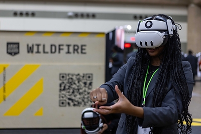 Disasterville, a mixed-reality experience from the Army National Guard, places students at the center of simulated Guard missions like firefighting. Students will put out small wildfires, combine forces to push back larger flare-ups, save animals, and dodge falling trees.