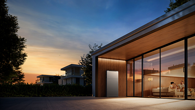 The EcoFlow OCEAN 2 series home energy storage system is installed outside a modern residence at dusk while a family relaxes inside through large glass windows.