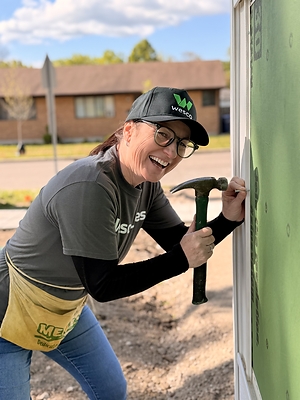 Wesco employee participating in a Habitat for Humanity build