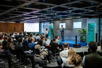 Willog CEO Jihyun Yoon delivers a presentation at 'Lloyd’s Lab unveils Cohort 17 following Pitch Day in London'.